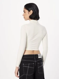 Ellesse T-shirts à Manches Longues T-shirt Femme Blanc Cassé -Pas Cher Univers T-shirt Magasin 02094dd86d9cc023d006de9bb8ee138a