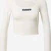 Ellesse T-shirts à Manches Longues T-shirt Femme Blanc Cassé -Pas Cher Univers T-shirt Magasin f70bb885b9312019eda7004cdf5609d2
